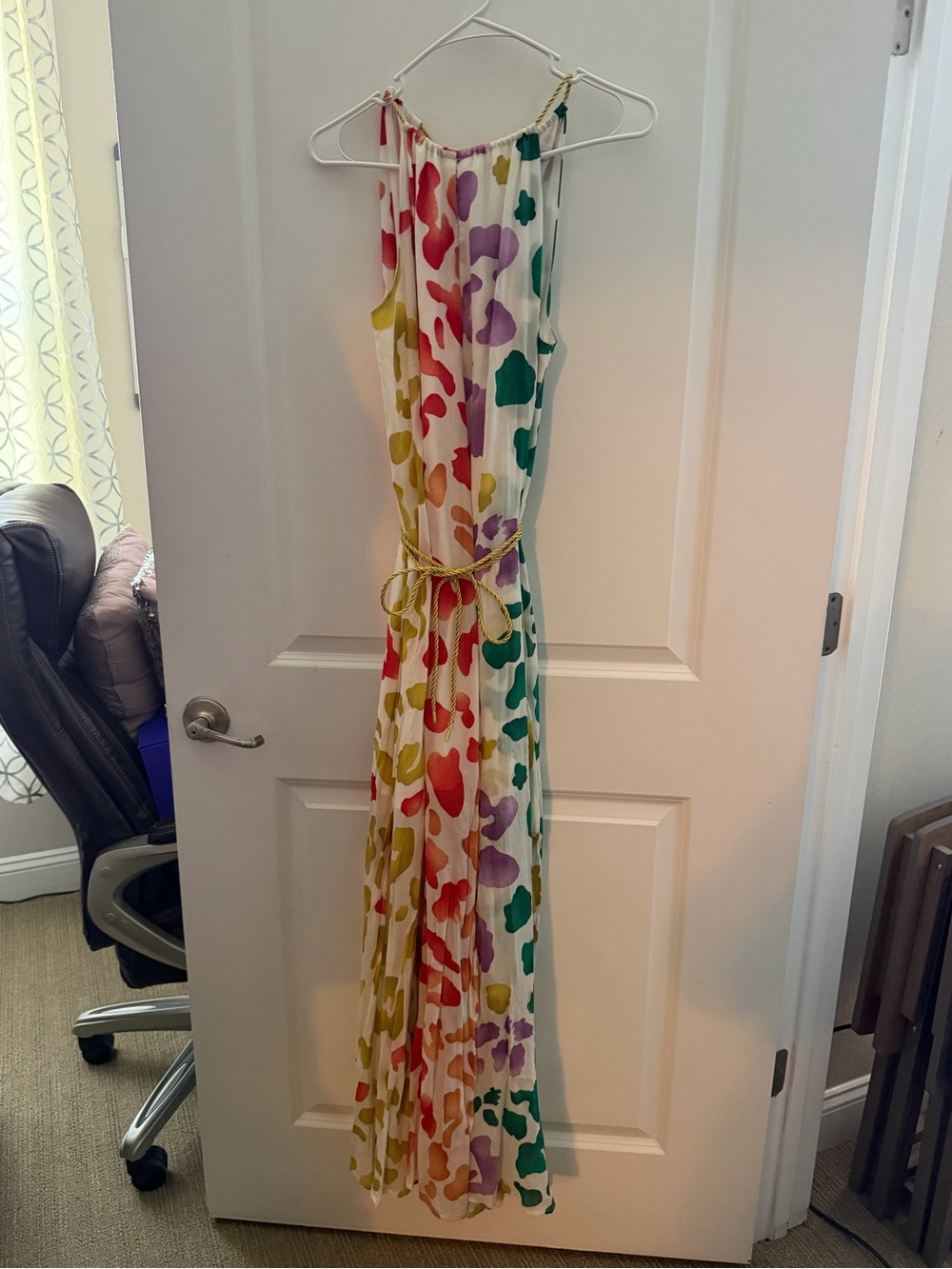 Eva Mendes Flowing White Maxi Dress with Rainbow Floral Print